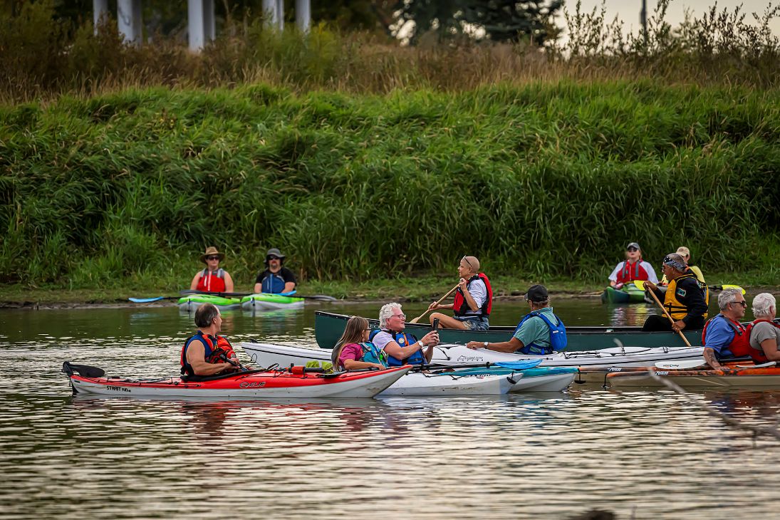 a group of kayakers on the river