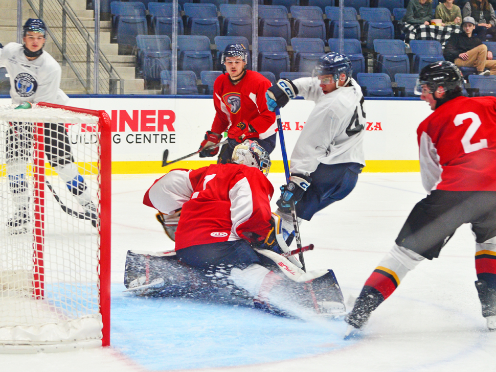Steinbach crashes the Niverville net during the Pistons 5-3 win over the Nighthawks