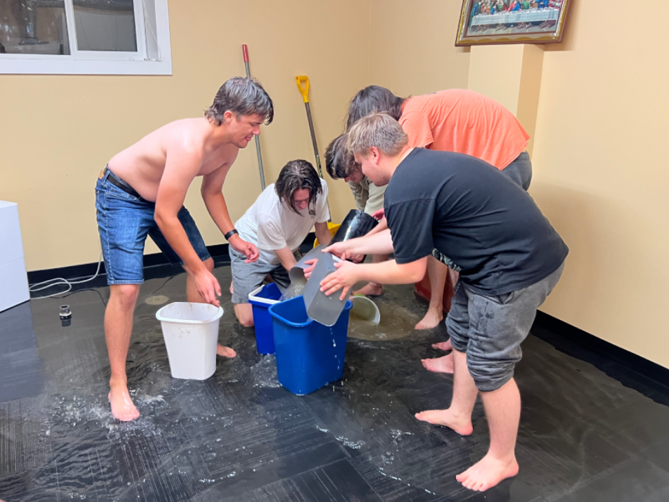 SBC students work together to manage flooding (photo provided by SBC)