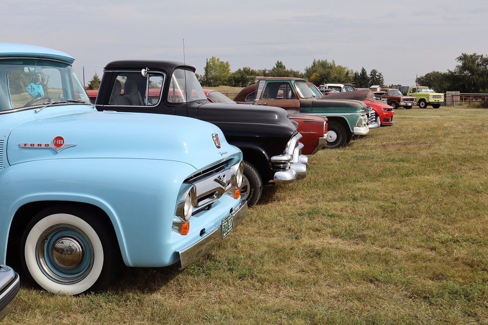 A line up of pickups and cars at the Webb Community Car Show. (photo by Carianne Hunter)