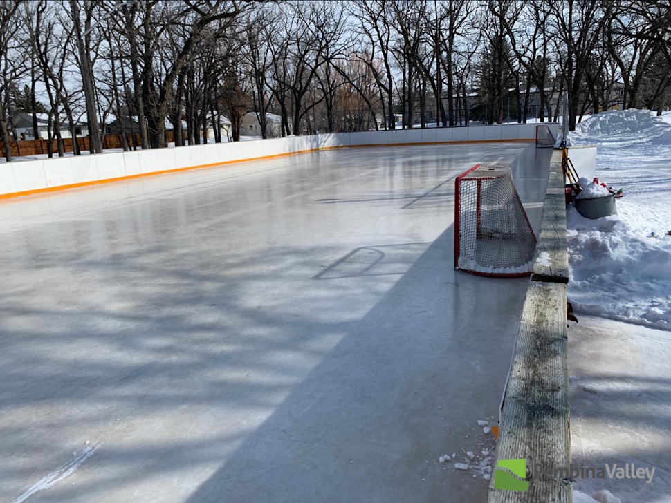 an ice rink on a winter day 