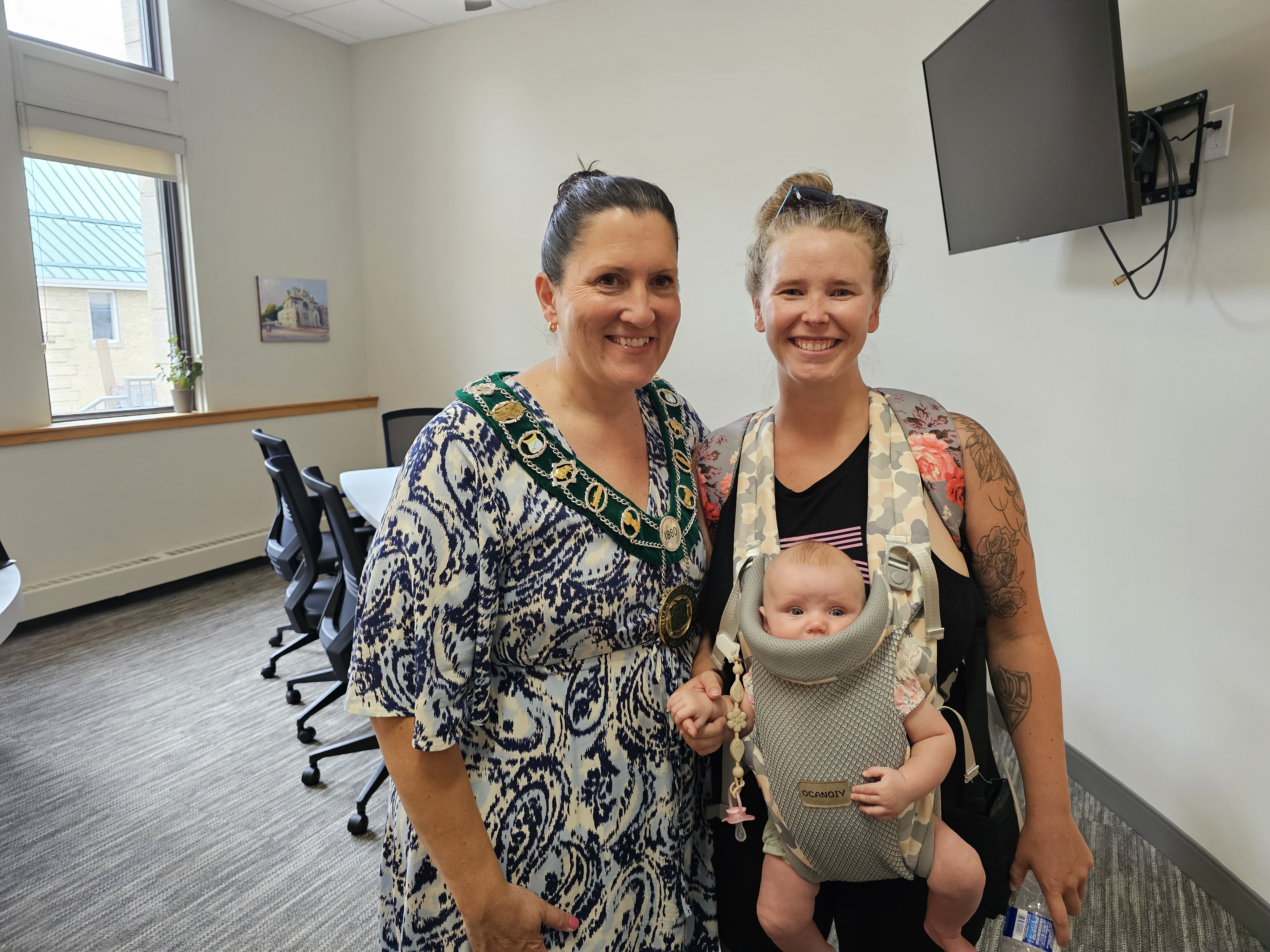Allana Downey got to pose with Mayor Knox for a photo, along with her daughter, who was quietly attentive throughout the entire event