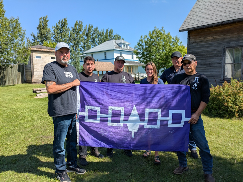 (Left to right) Jay Smith, Todd Thomas Jr., Artie Martin, museum Executive Director Emma Ens-MacIver, Todd Thomas Sr., and Trevor Thomas gather at Fort la Reine on Tuesday during SNIPE’s latest paranormal investigation.