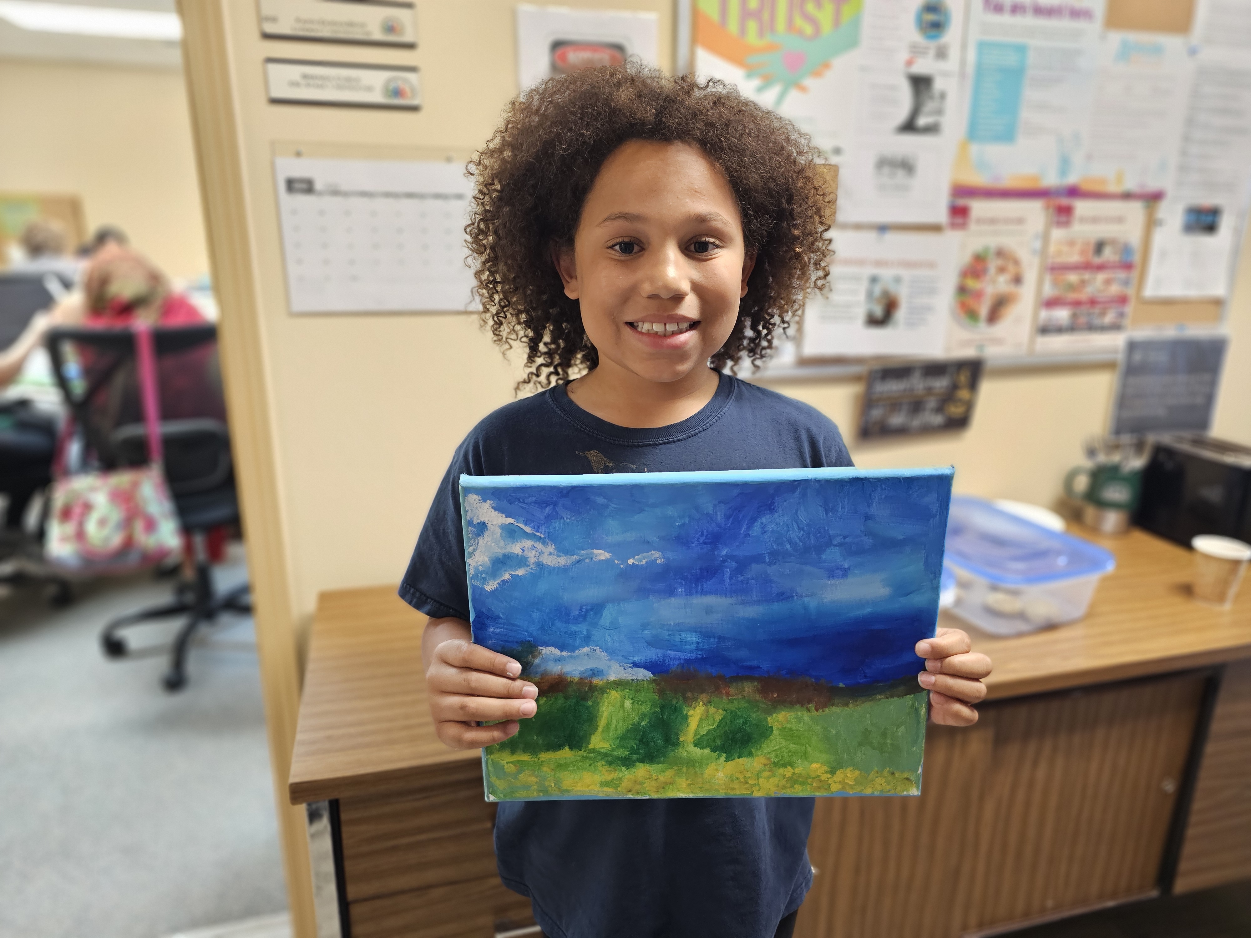Gabe proudly holds yet another rendition of the classic Van Gogh painting