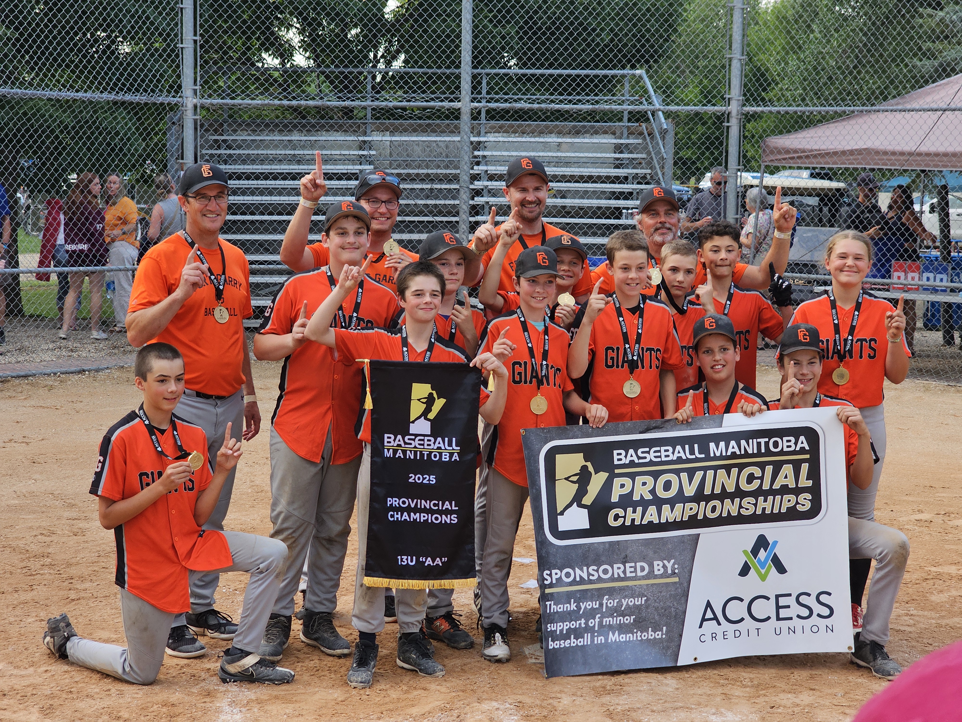 The Fort Gary Giants hold up their fingers in the air, declaring that they are indeed Manitoba's #1 in the league
