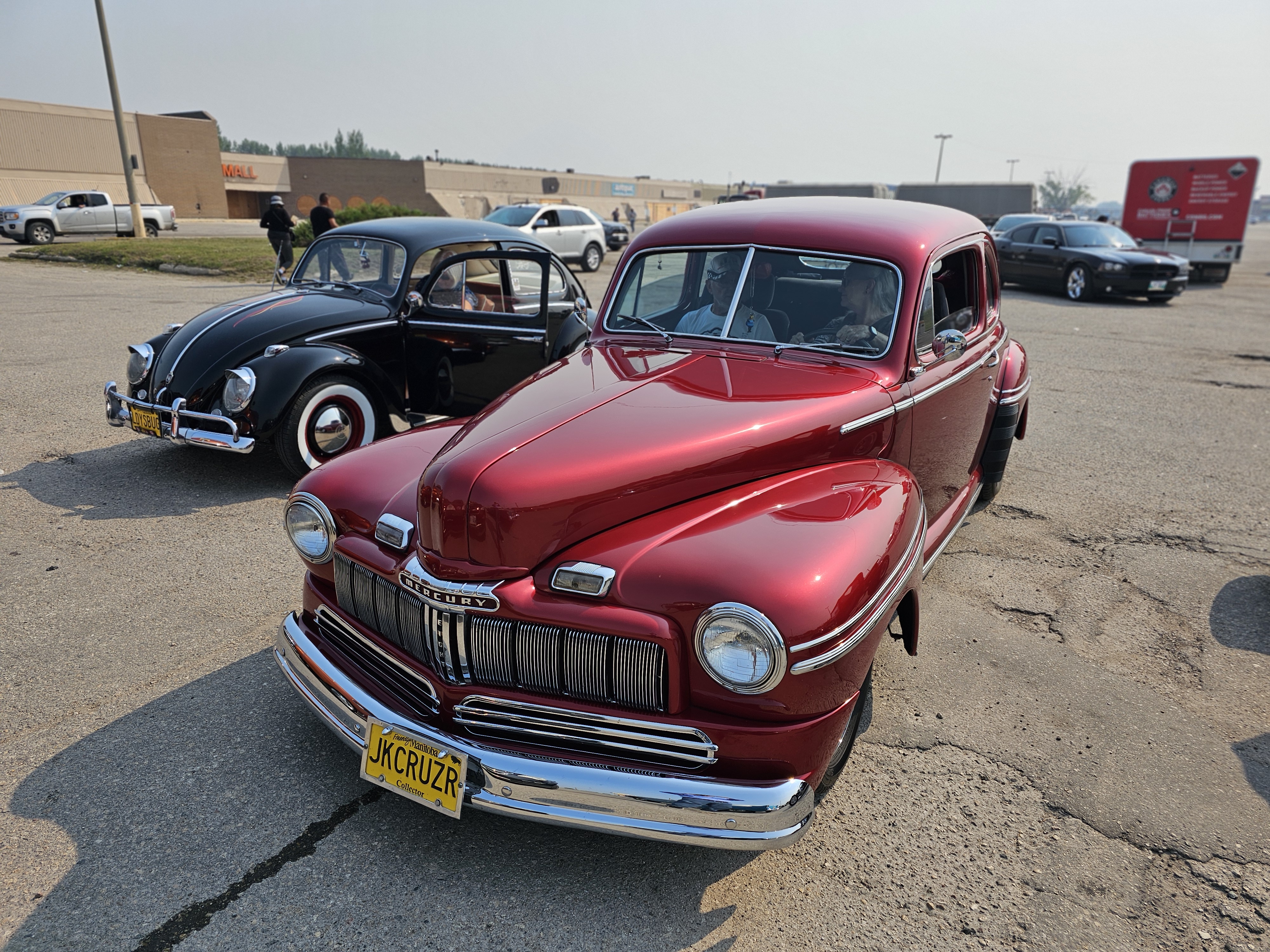A gleaming red Mercury, a beautiful example of mid-century design.