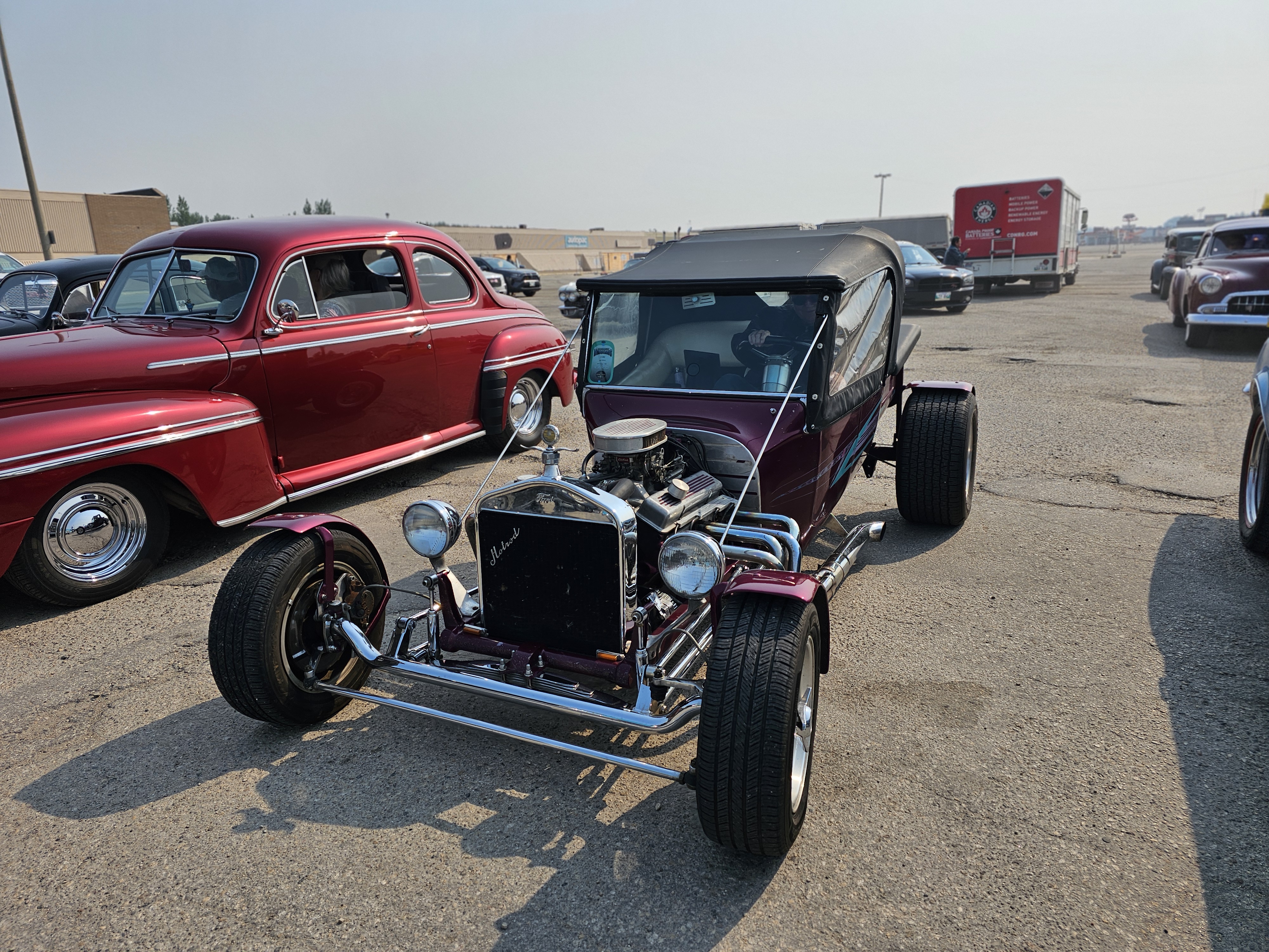 A custom-built purple hot rod, a true testament to individual craftsmanship.