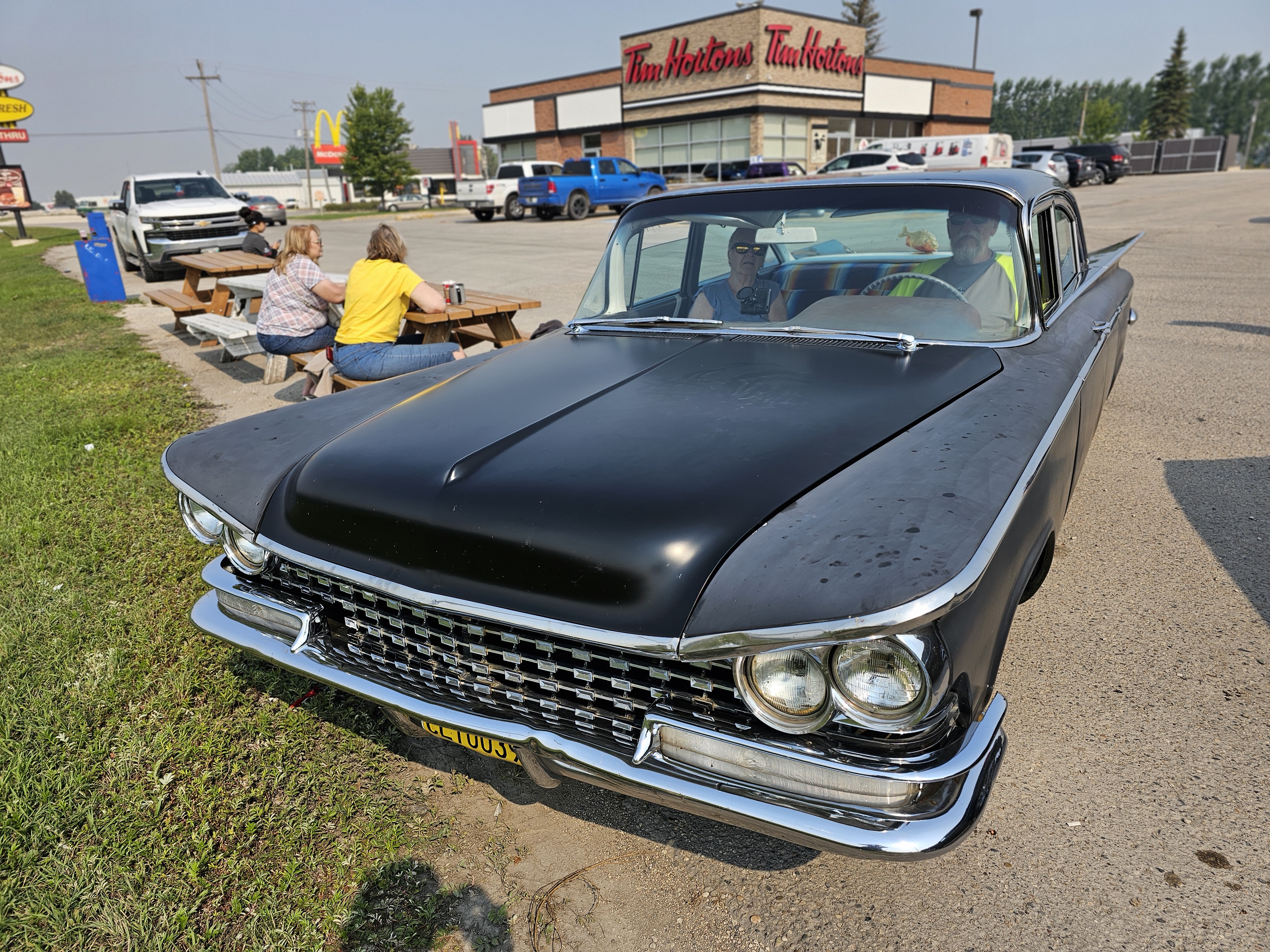 A sophisticated black 1959 Buick, a true symbol of luxury from its era.