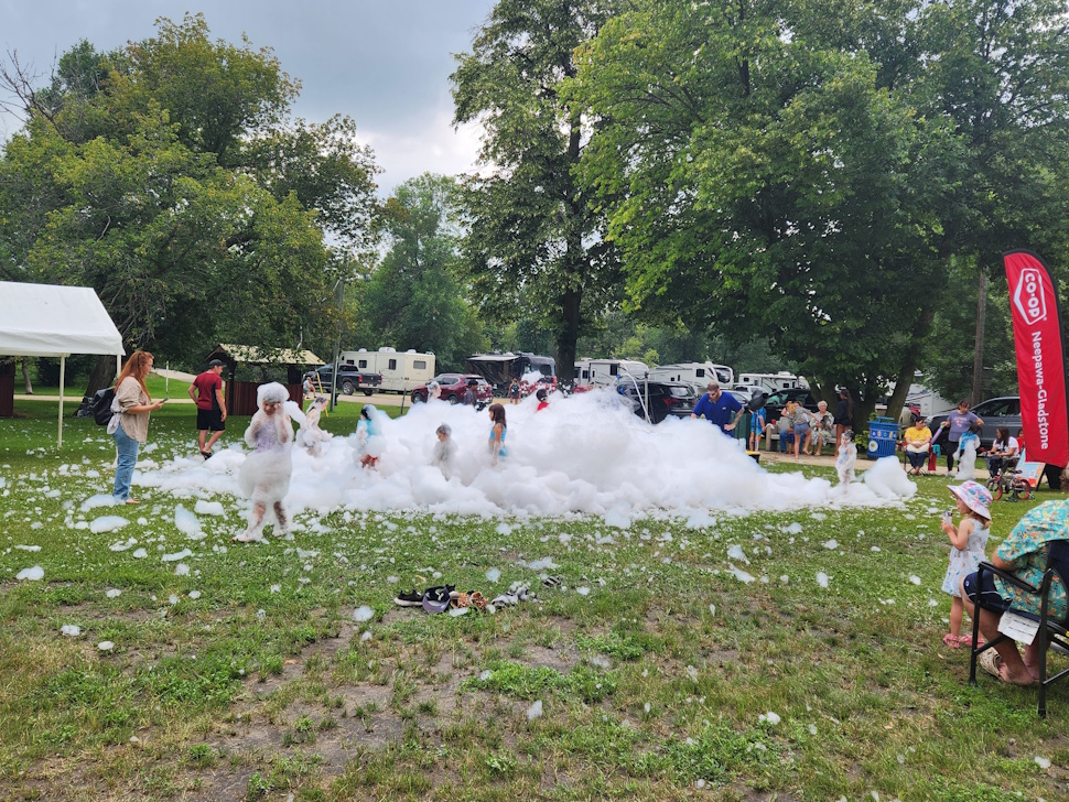 Foam party was a blast for the kids, running in and out of the pool back to the foam.   PortageOnline/ Tristen Sokolosky