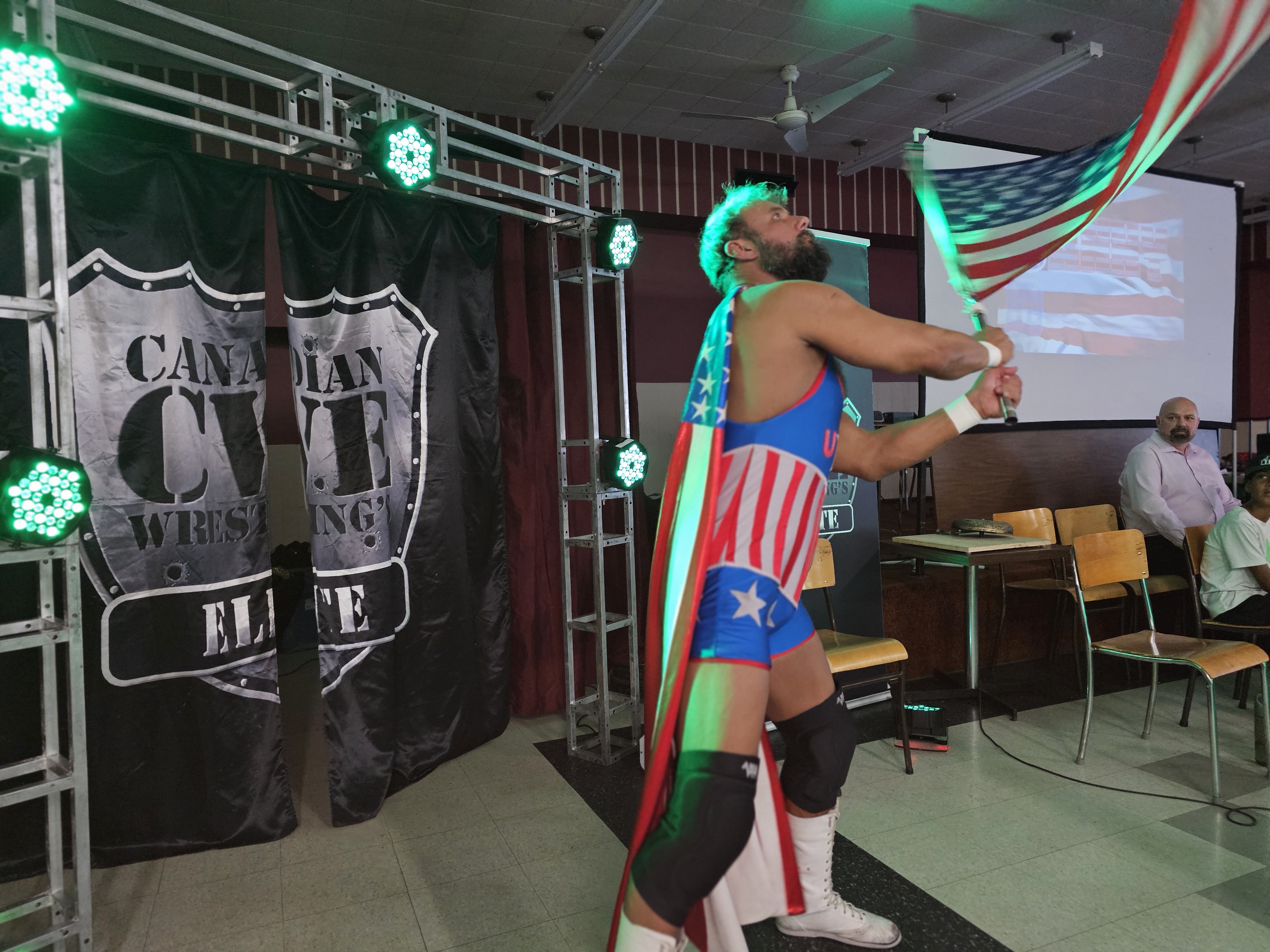 "Hotshot" Danny Duggan waves the American flag while shouting "U.S.A."