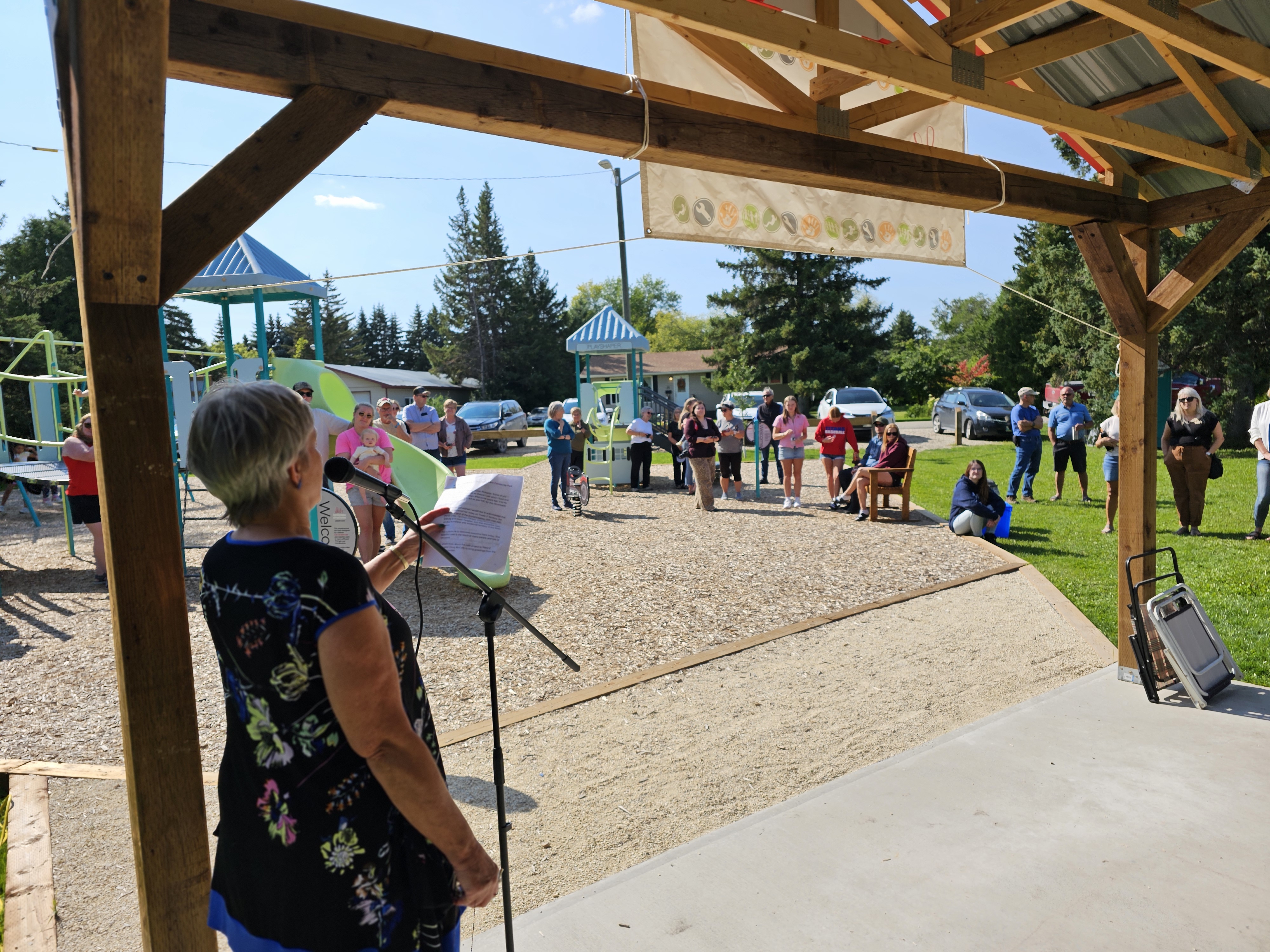 Speeches being given from the Peony Farm Park picnic shelter