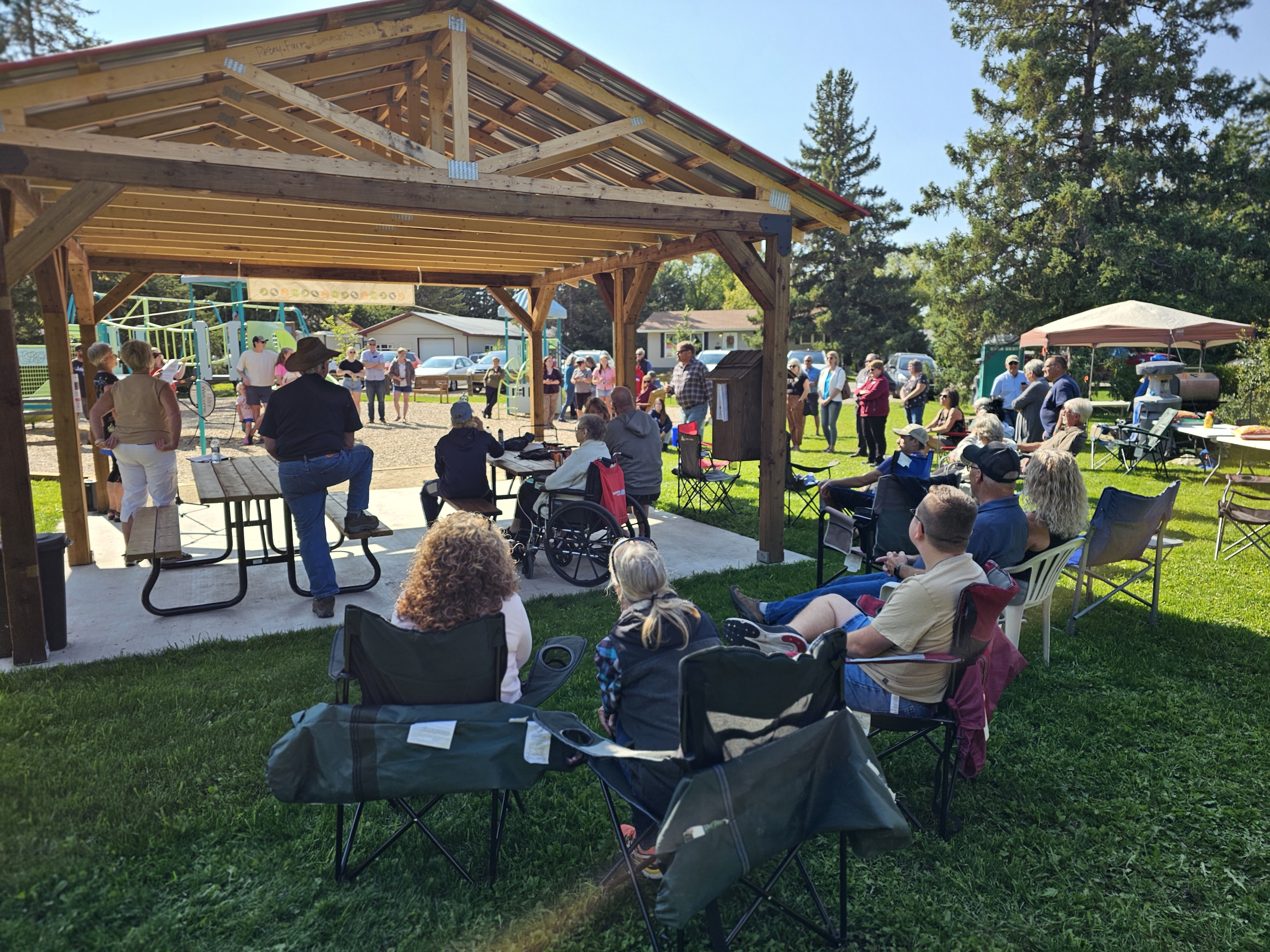 Between 75 to 80 people were in attendance at the grand opening of the new Peony Farm Park