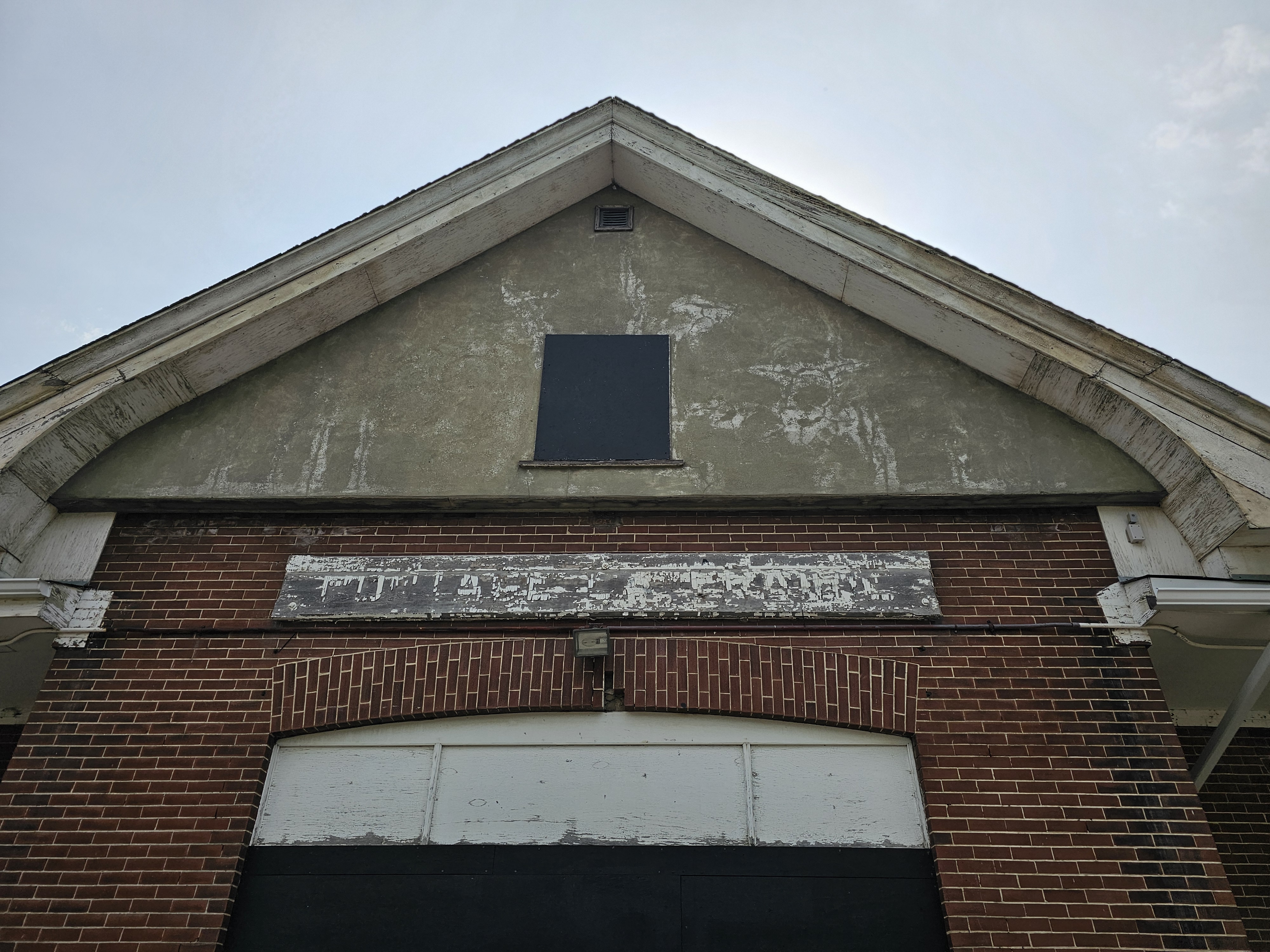 The structure of the Portage la Prairie Passenger Train station showing signs of age.