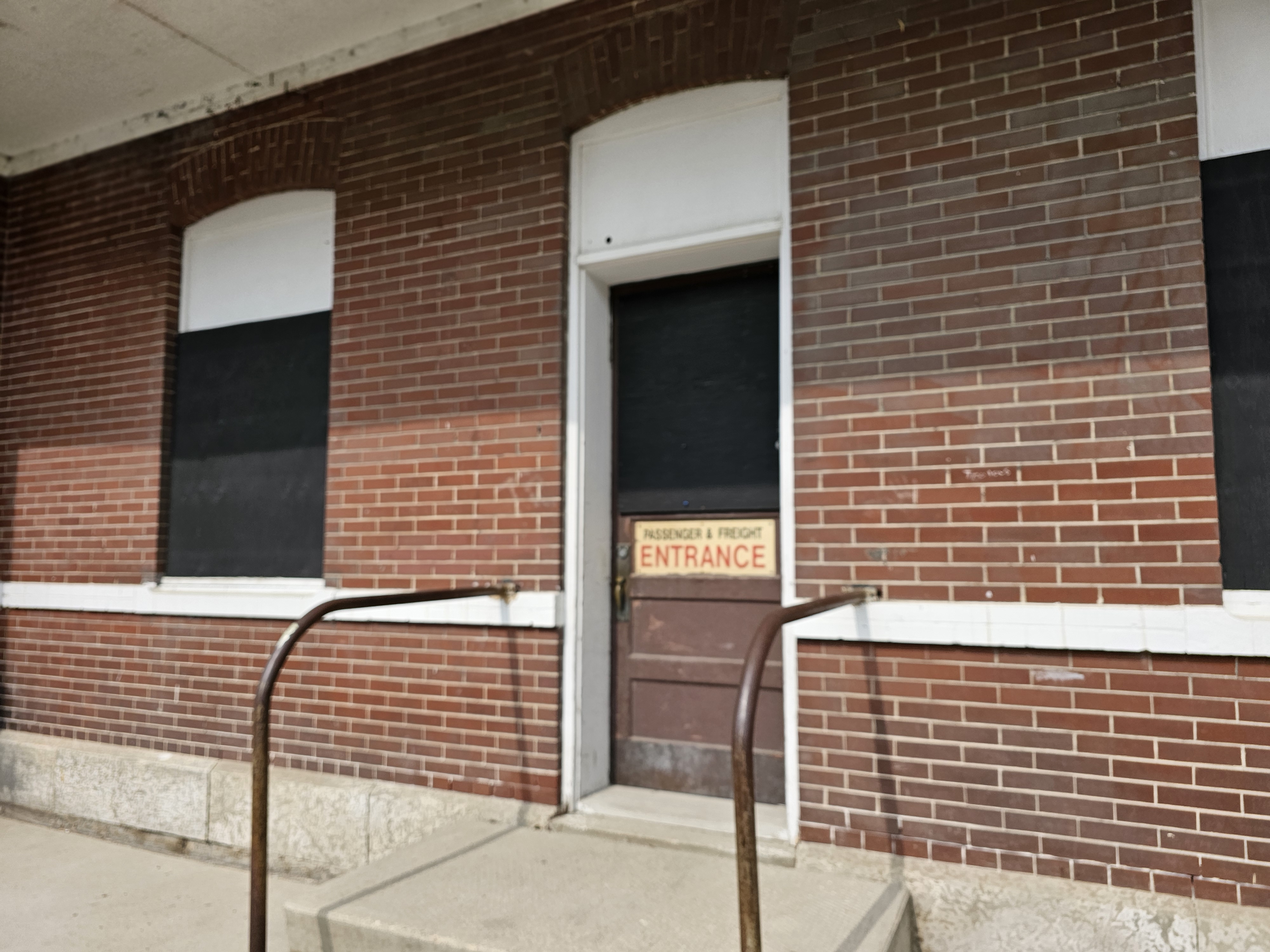 Boarded up windows and locked doors at the Portage la Prairie passenger train station.