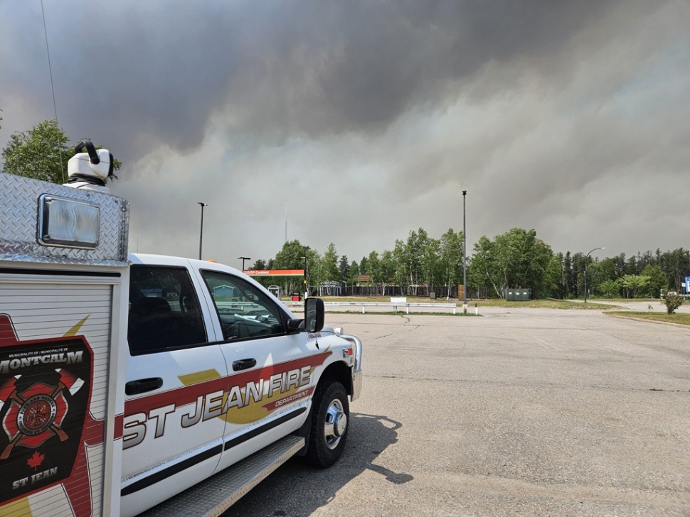 st jean fire truck facing plume of smoke