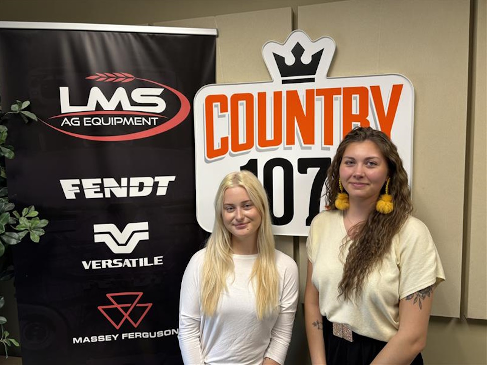 Representatives of Agape House in the Country 107 studio