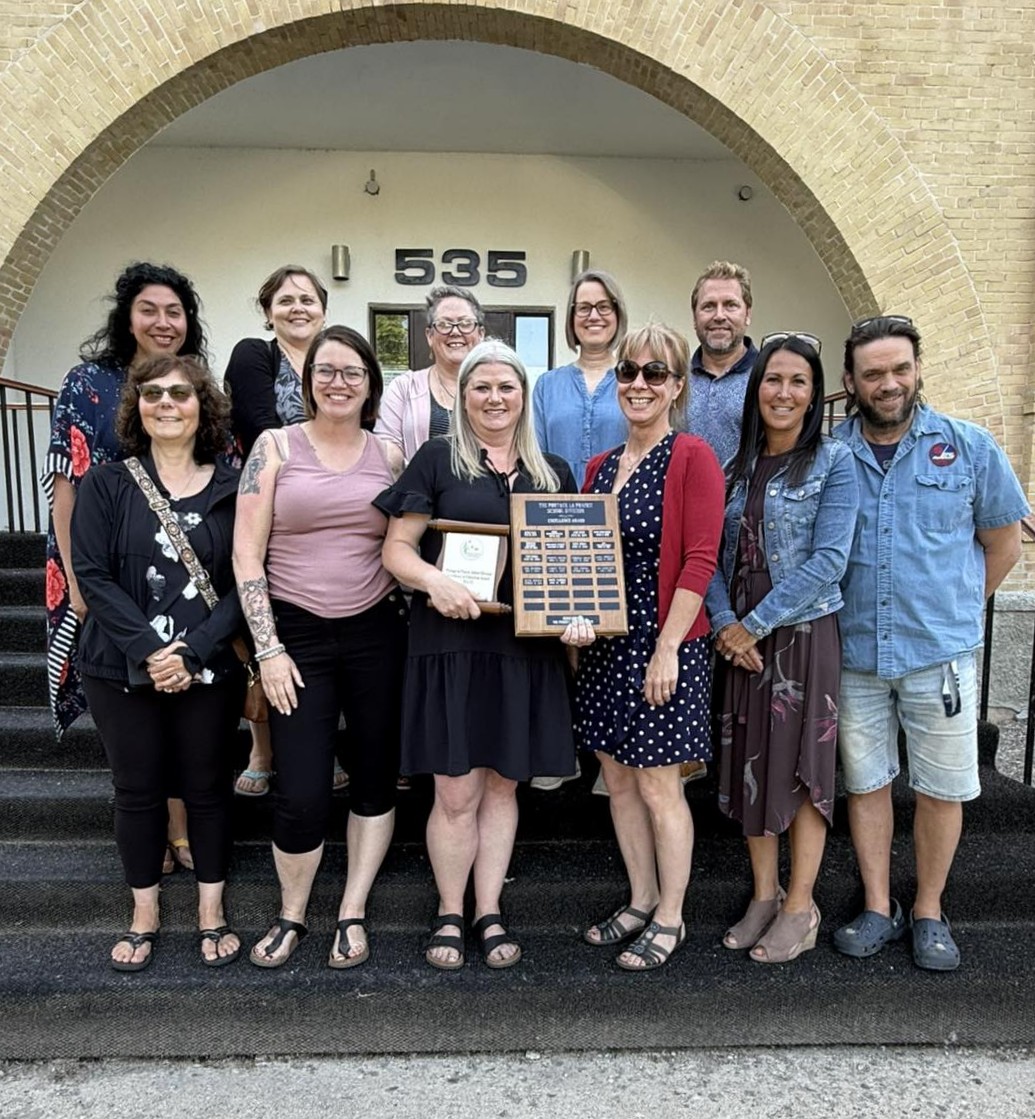 Tricia Sawchuk with her OVS colleagues after receiving her award on Wednesday evening