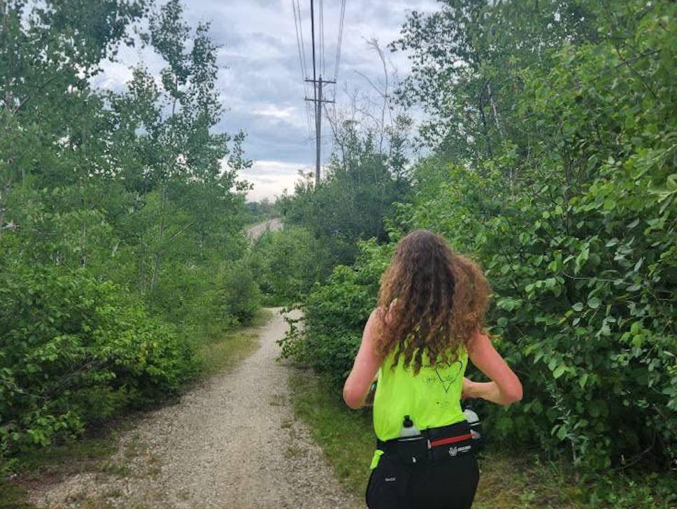 Diane running through the scenic trails near Falcon Lake yesterday. Submitted Photo/Diane Wing