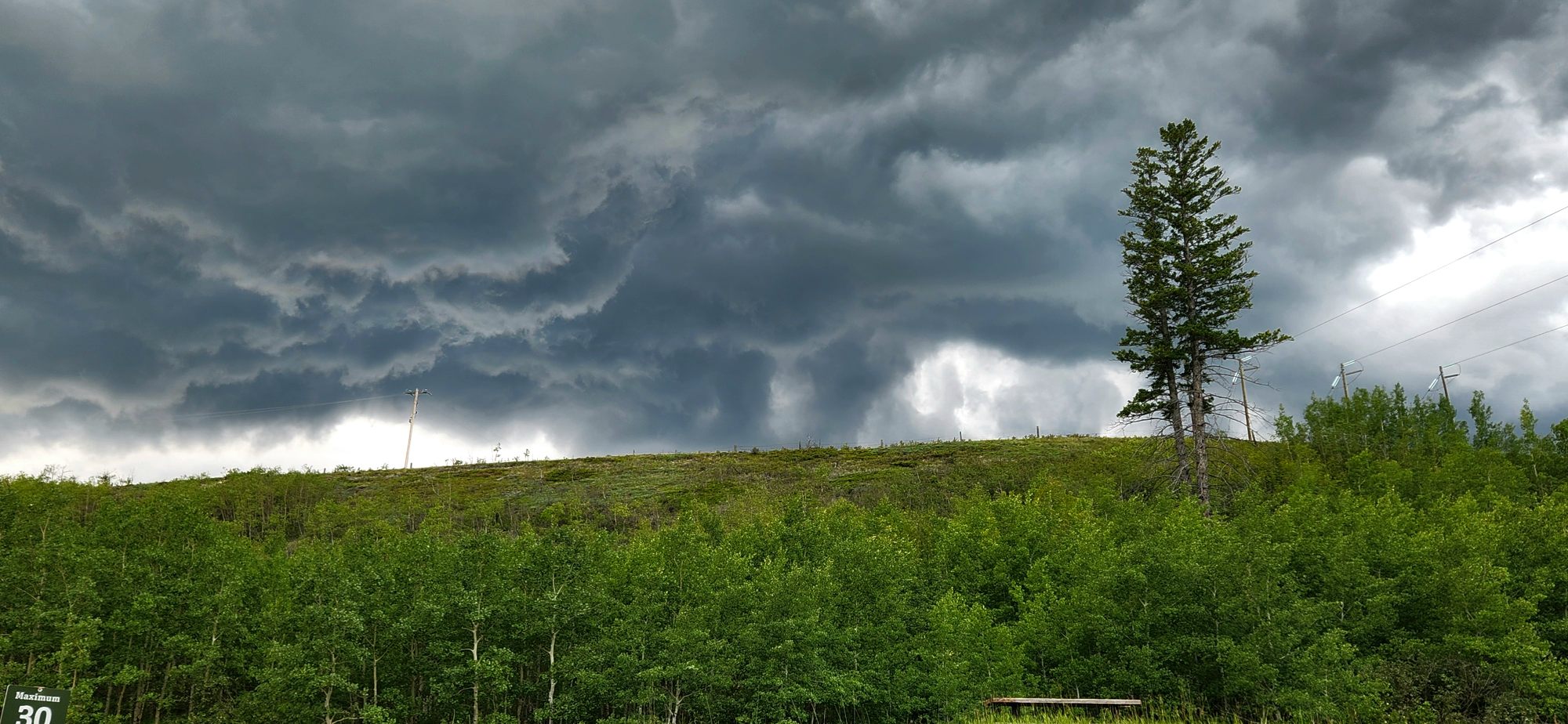 Dark skies close in over Ghost Lake just minutes after paddlers launched. Thunder quickly pushed kayakers back to shore.