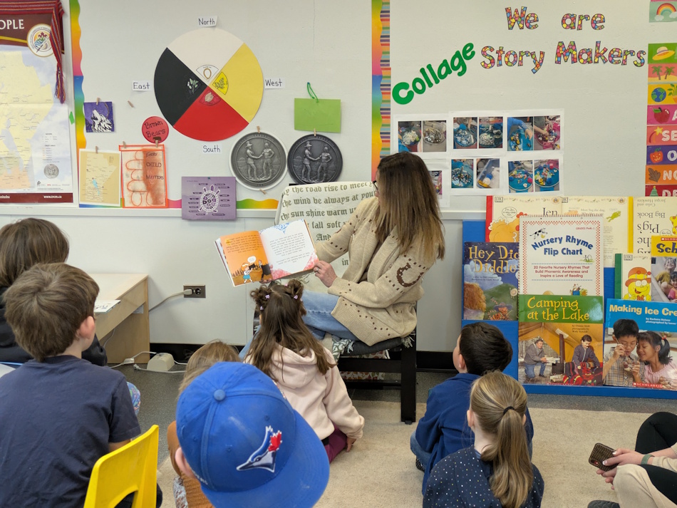 Brenda Solomon reading to her granddaughter's kindergarten class