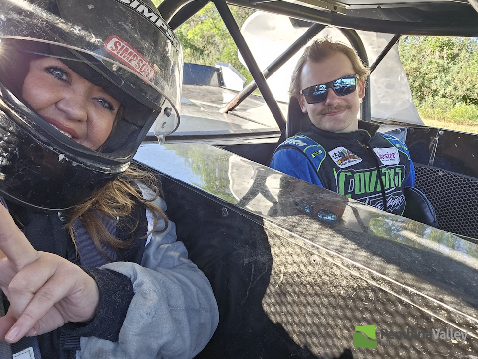 Jayme with Bailey Cousins in the ride-a-long car