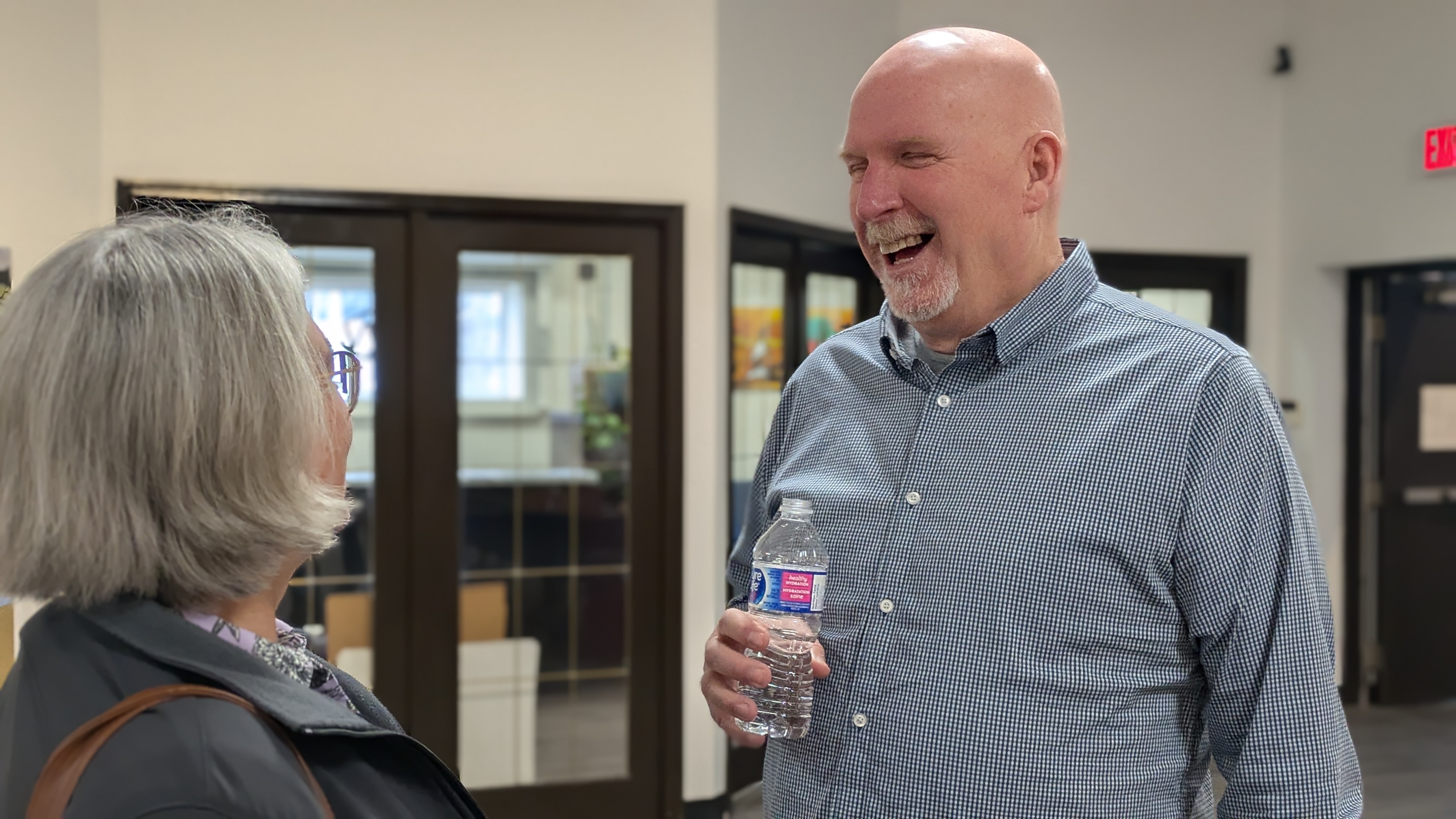 Don Boddy speaking with Dawn Froese