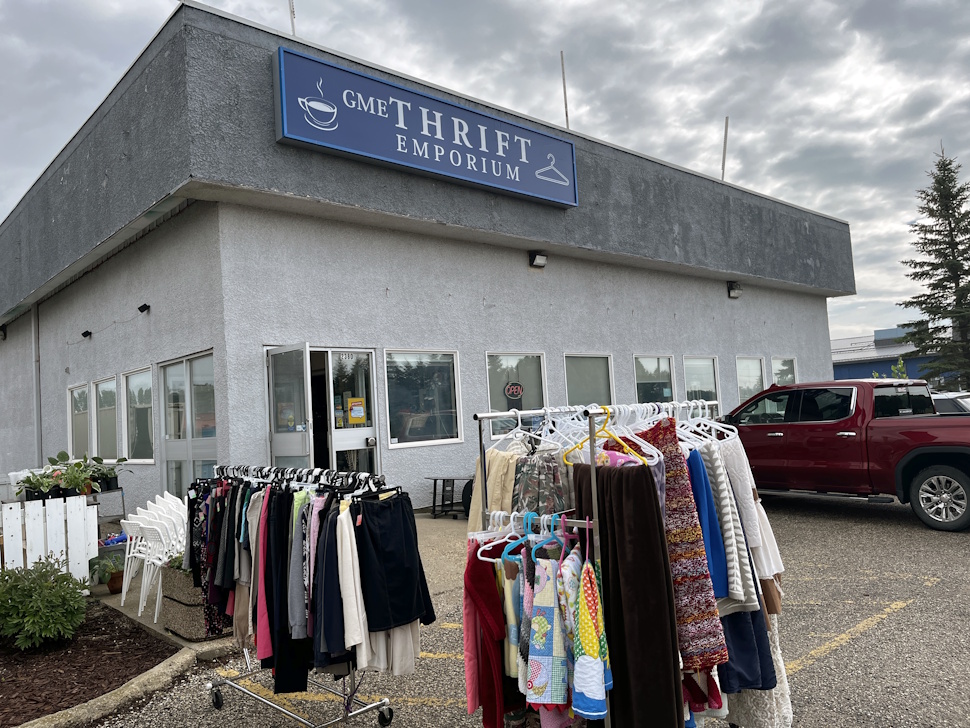 Wide exterior shot of GME Thrift Emporium on Sissons Drive taken Friday morning, showing the damaged south wall and the surrounding area.