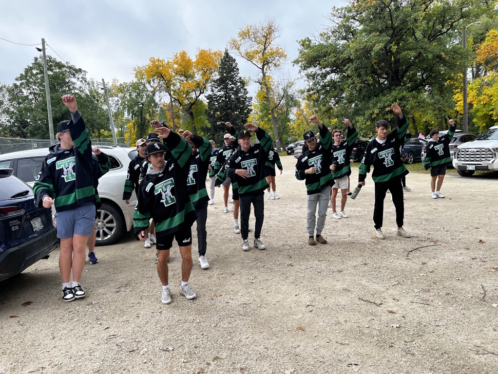 Terriers players take part in warm-ups led by fitness instructor Monique Laramee before the start of the 45th annual Terry Fox Run at Island Park on Sunday. PortageOnline/Cory Knutt