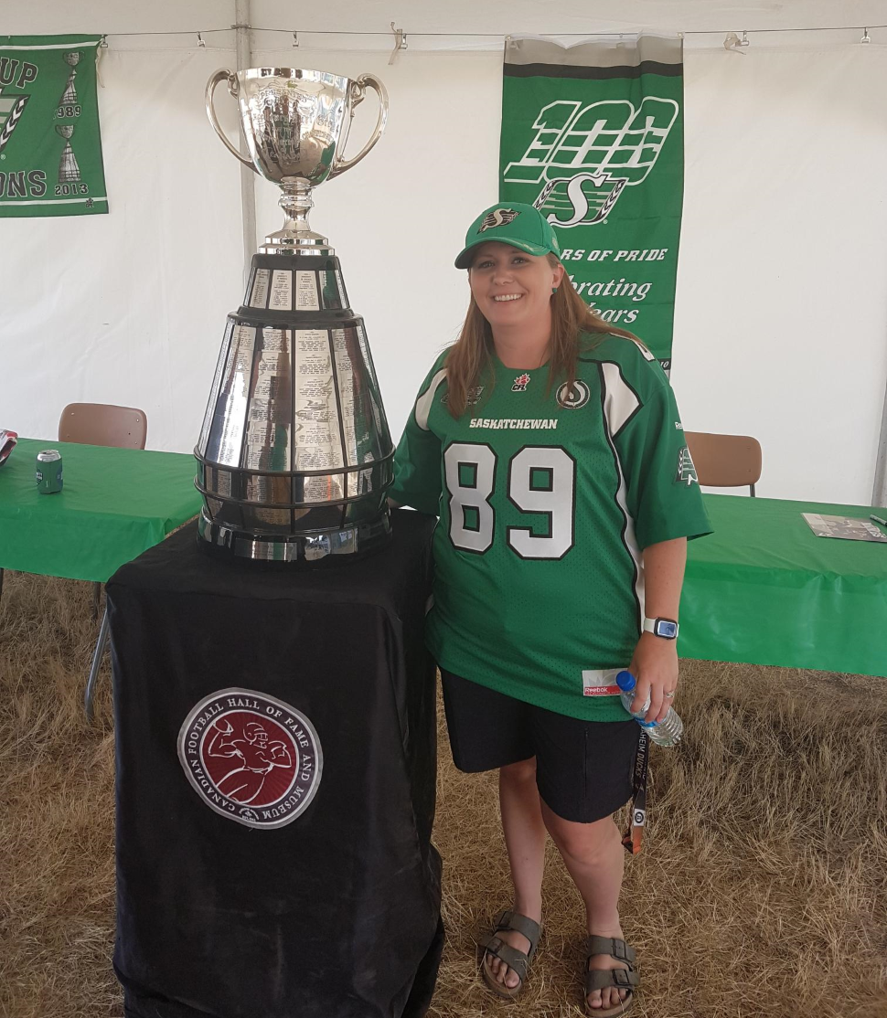 Jenn Biensch with the Grey Cup