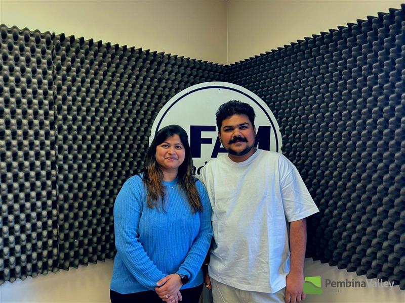 two people in a studio
