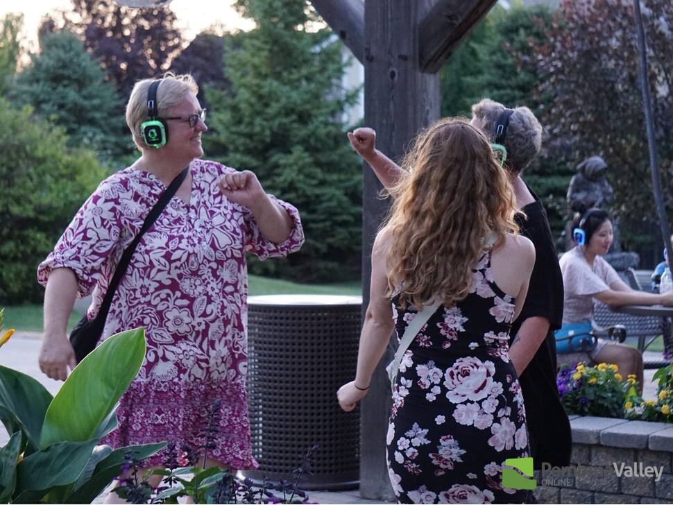 People dance during the silent disco
