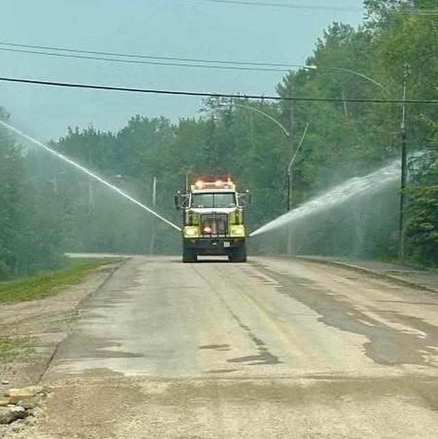 Morden's tanker spraying down the bush perimeter