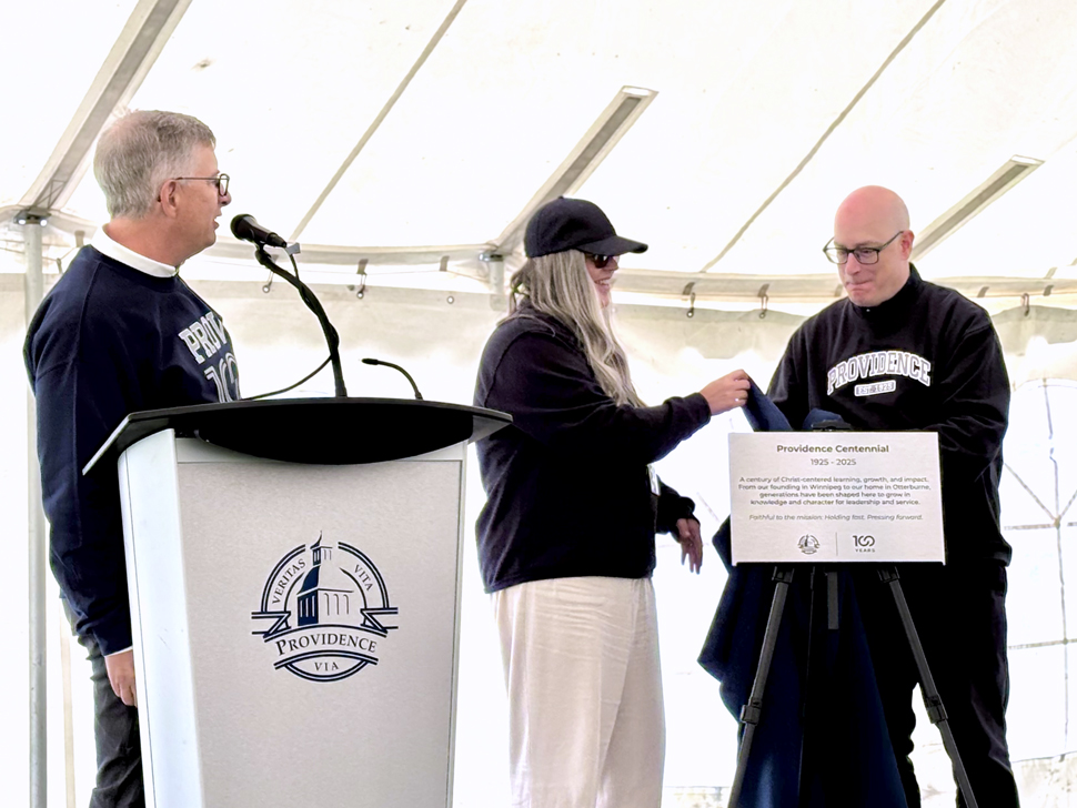 President of Prov, Kent Anderson (left) together with Dr. Nicholas Greco (right), unveil a dedication plaque during Saturday's celebrations.