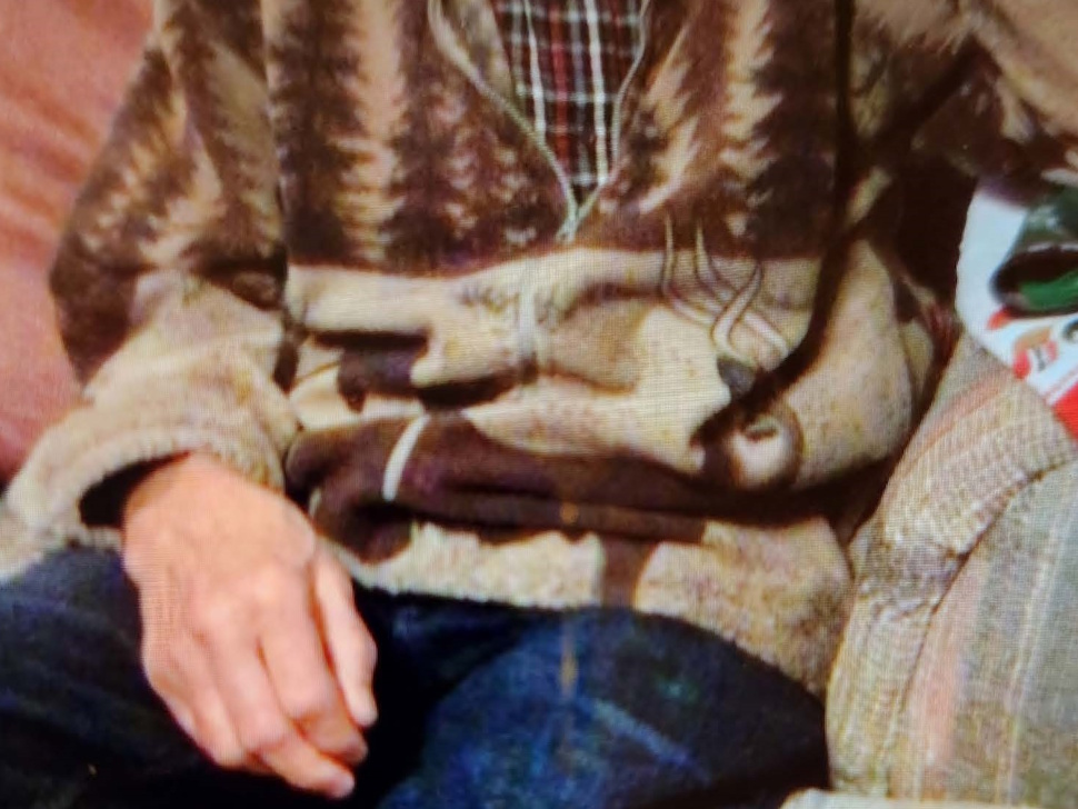 Close-up photo of a fleece jacket and blue jeans similar to what missing man Ralph Osterwald was last seen wearing.