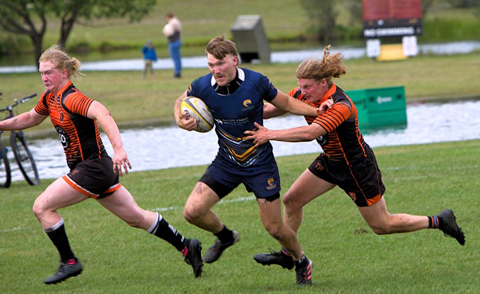Grizz Brennan Bourchier is hotly pursued on a successful try. Cochrane Now/Noel Edey