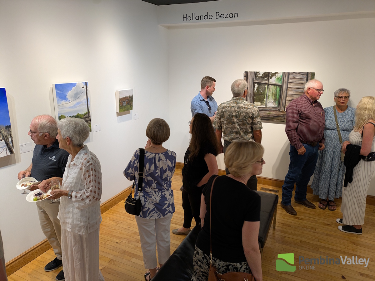 Attendees at Thursday's Friends of the Gallery season two opening gala enjoying Bezan's pieces