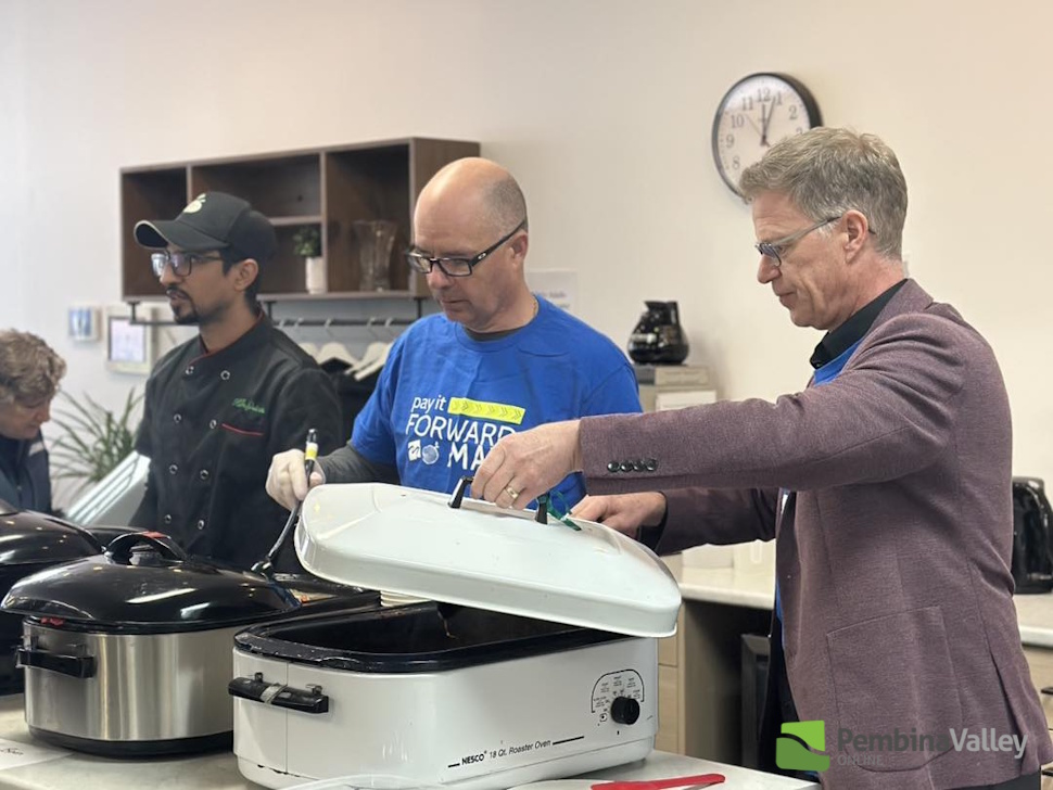 From MHRC Facebook page: Mohsin Awan serving food at the May Community Meal
