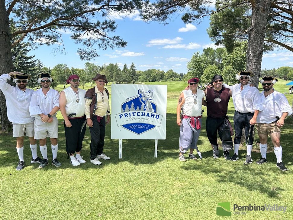 golfers with a sign 