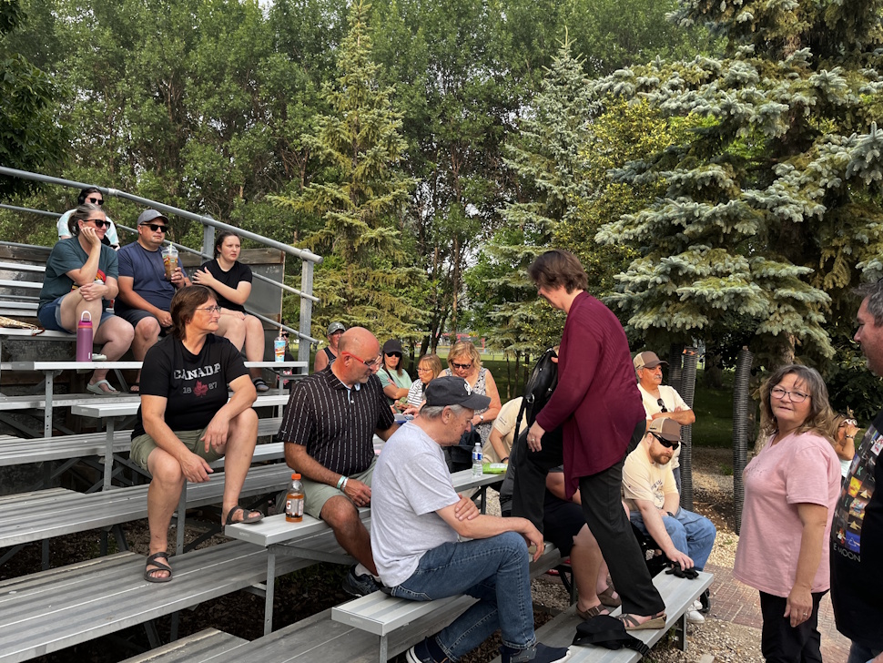 A lively crowd watches the Battle of the Tater Titans charity softball game at Rotary Republic Park.