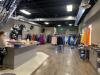 YFC Warehouse with racks of dresses