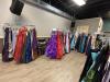 YFC Warehouse with racks of dresses