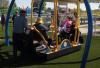 Bentlee Alwood and Madison Alger on the new accessible swing.