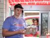 a man stands in a delivery window
