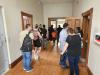 The group explores the upstairs level, right outside council chambers