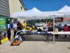Enns Brothers Portage, having their table out with some equipment in front. PortageOnline/ Tristen Sokolosky