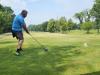 A golfer follows through on a strong drive under hot, humid skies during Stride’s fundraising tournament at Portage Golf Club. PortageOnline/ Tristen Sokolosky
