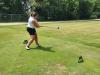 A golfer follows through on a strong drive under hot, humid skies during Stride’s fundraising tournament at Portage Golf Club. PortageOnline/ Tristen Sokolosky