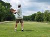 A golfer follows through on a strong drive under hot, humid skies during Stride’s fundraising tournament at Portage Golf Club. PortageOnline/ Tristen Sokolosky