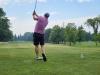 A golfer follows through on a strong drive under hot, humid skies during Stride’s fundraising tournament at Portage Golf Club. PortageOnline/ Tristen Sokolosky