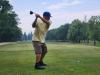 A golfer follows through on a strong drive under hot, humid skies during Stride’s fundraising tournament at Portage Golf Club. PortageOnline/ Tristen Sokolosky
